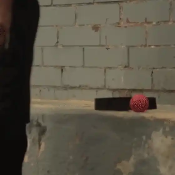 Engaged person practicing with reflex ball